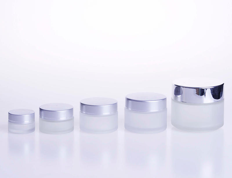 Cream jar in frosted glass with silver caps 
